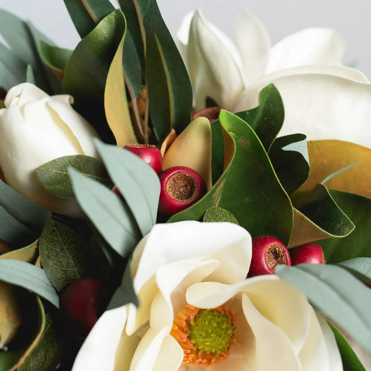 Yulemere White Magnolia Red Crabapple and Needle Leaf Holiday Centerpiece overall view