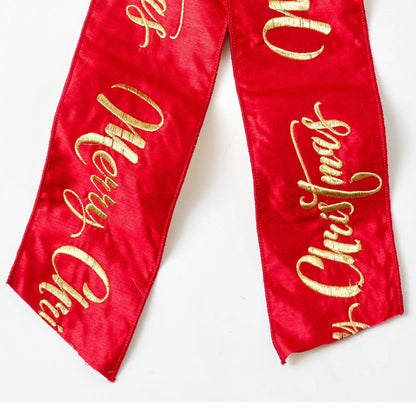 Yulemere Extra Large Reversed Red and Gold Dupion Merry Holiday Bow detail view 2